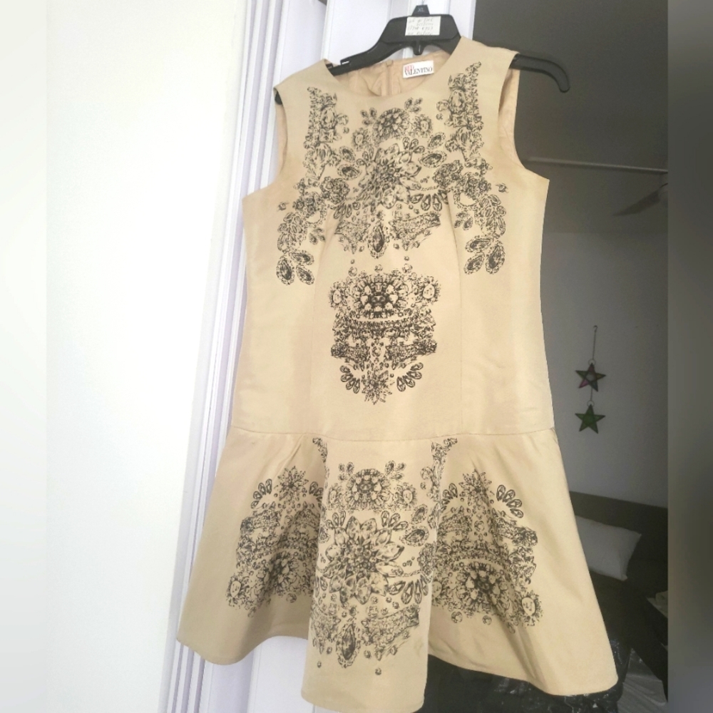 Beige Dress with Black Floral Design